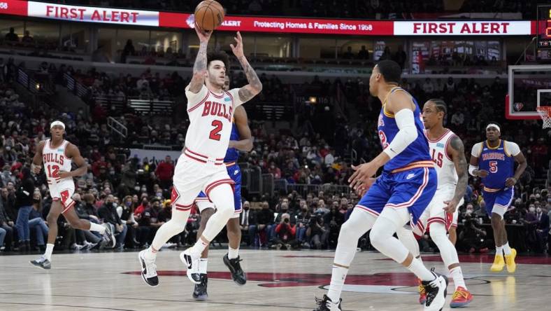 Jan 14, 2022; Chicago, Illinois, USA; Chicago Bulls guard Lonzo Ball (2) looks to pass the ball against the Golden State Warriors during the first half at United Center. Mandatory Credit: David Banks-USA TODAY Sports