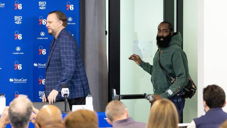 Feb 15, 2022; Camden, NJ, USA; Philadelphia 76ers guard James Harden (R) and president of basketball operations Daryl Morey (L) enter a press conference at Philadelphia 76ers Training Complex. Mandatory Credit: Bill Streicher-USA TODAY Sports