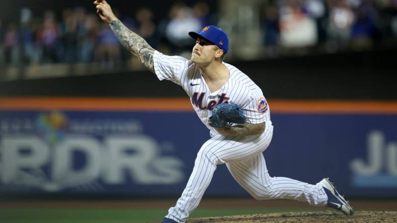 Apr 30, 2022; New York City, New York, USA; New York Mets relief pitcher Sean Reid-Foley (61) pitches against the Philadelphia Phillies during the seventh inning at Citi Field. Mandatory Credit: Brad Penner-USA TODAY Sports