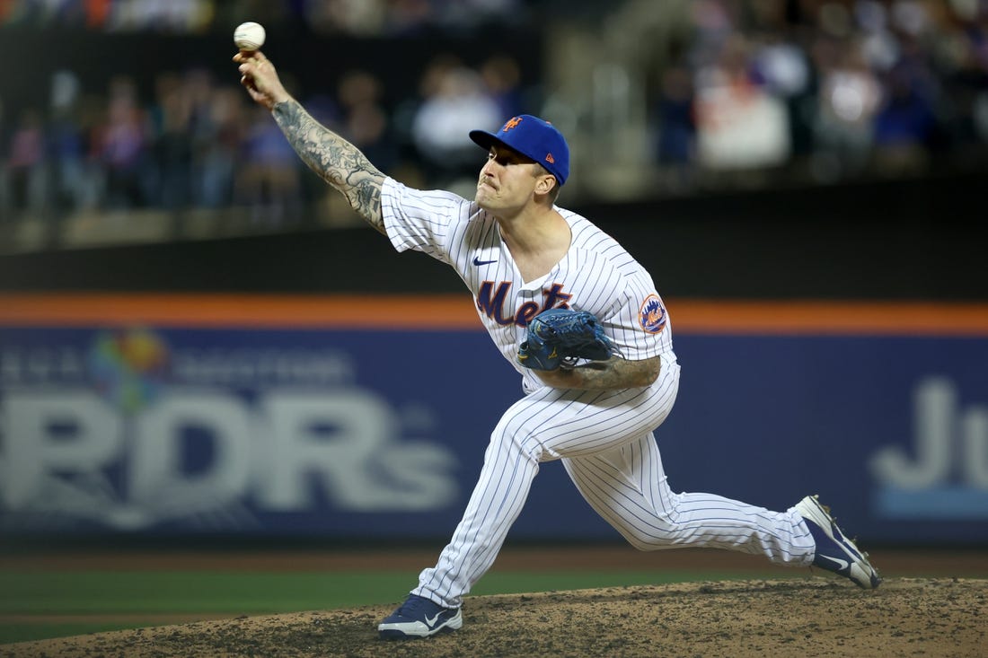 Apr 30, 2022; New York City, New York, USA; New York Mets relief pitcher Sean Reid-Foley (61) pitches against the Philadelphia Phillies during the seventh inning at Citi Field. Mandatory Credit: Brad Penner-USA TODAY Sports