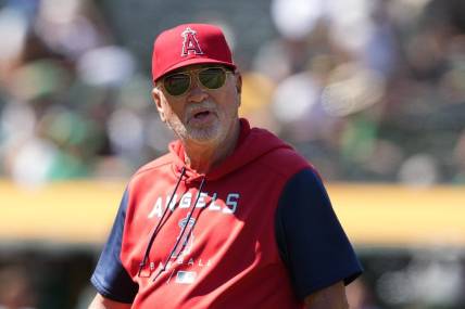 May 14, 2022; Oakland, California, USA; Los Angeles Angels manager Joe Maddon (70) walks to the dugout during the seventh inning against the Oakland Athletics at RingCentral Coliseum. Mandatory Credit: Darren Yamashita-USA TODAY Sports