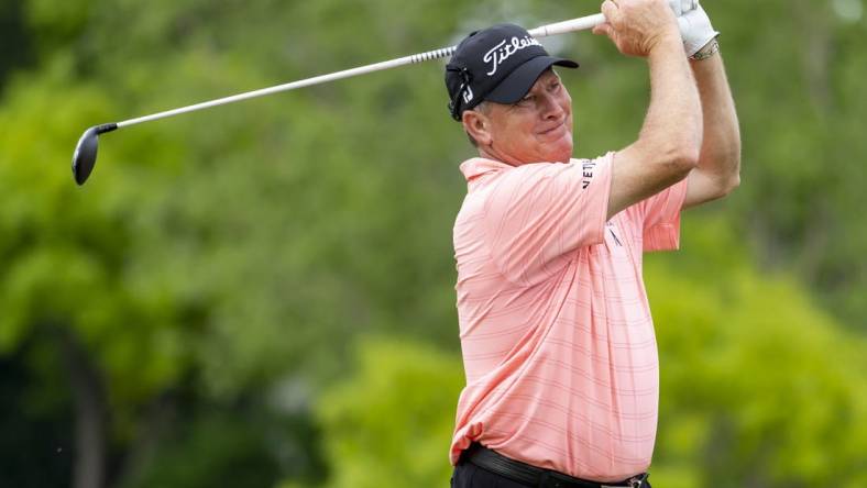 May 26, 2022; Benton Harbor, Michigan, USA; Woody Austin hits his tee shot on the eighth hole during the first round of the 2022 KitchenAid Senior PGA Championship at Harbor Shores. Mandatory Credit: Raj Mehta-USA TODAY Sports