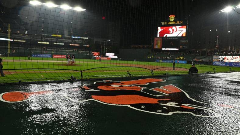 Jun 22, 2022; Baltimore, Maryland, USA;  A detail view of the Baltimore Orioles logo on top of the home dugout during the game Washington Nationals d at Oriole Park at Camden Yards. Baltimore Orioles defeated Washington Nationals 7-0 in a rain shorten game. Mandatory Credit: Tommy Gilligan-USA TODAY Sports