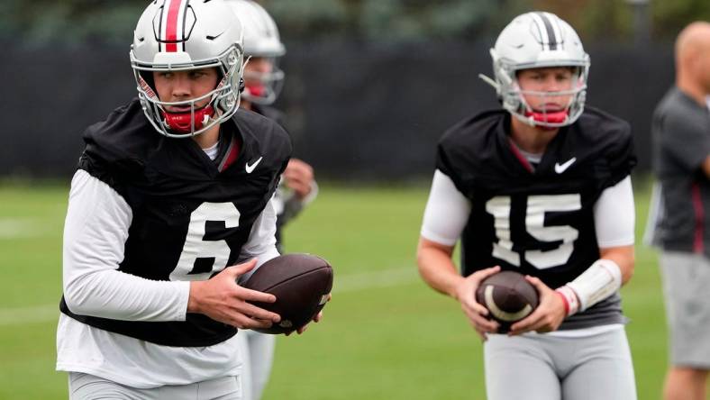 Aug 5, 2022; Columbus, OH, USA; Ohio State Buckeyes quarterback Kyle McCord (6) and Ohio State Buckeyes quarterback Devin Brown (15) during practice at Woody Hayes Athletic Center in Columbus, Ohio on August 5, 2022.

Ceb Osufb0805 Kwr 10