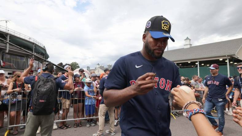 Boston Red Sox player Franchy Cordero signs autographs at the Little League World Series in South Williamsport, Pennsylvania, on Sunday, Aug. 21, 2022. The Red Sox and Baltimore Orioles played in the Little League Classic at Bowman Field on Sunday night.

CP 4