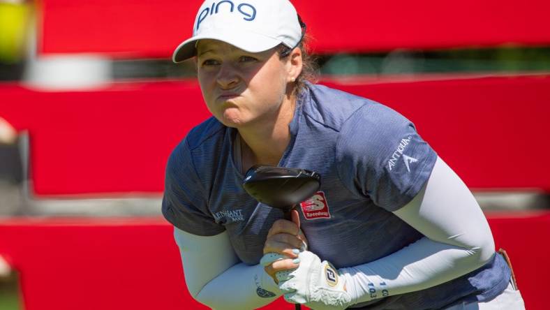 Aug 27, 2022; Ottawa, Ontario, CAN; Ally Ewing from the United States follows the ball after teeing off from the 10th hole during the third round of the CP Women's Open golf tournament. Mandatory Credit: Marc DesRosiers-USA TODAY Sports