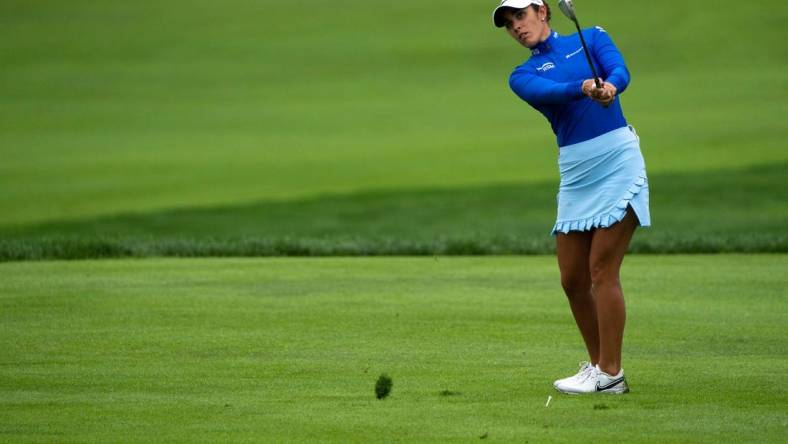 Ally Ewing watches her approach shot on hole two of the Kendale Course during the final round of the Kroger Queen City Championship presented by P&G at the Kenwood Country Club in Madeira on Sunday, Sept. 11, 2022.

Lpga Queen City Championship 0170