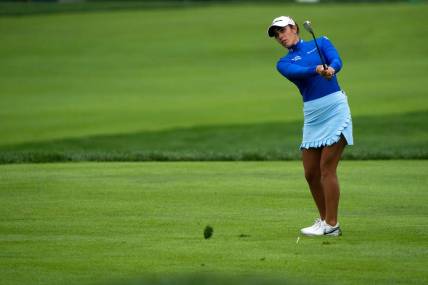 Ally Ewing watches her approach shot on hole two of the Kendale Course during the final round of the Kroger Queen City Championship presented by P&G at the Kenwood Country Club in Madeira on Sunday, Sept. 11, 2022.

Lpga Queen City Championship 0170