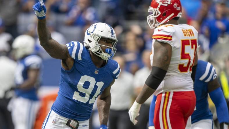 Sep 25, 2022; Indianapolis, Indiana, USA; Indianapolis Colts defensive end Yannick Ngakoue (91) celebrates sacking Kansas City Chiefs quarterback Patrick Mahomes (not pictured) during the second quarter at Lucas Oil Stadium. Mandatory Credit: Marc Lebryk-USA TODAY Sports