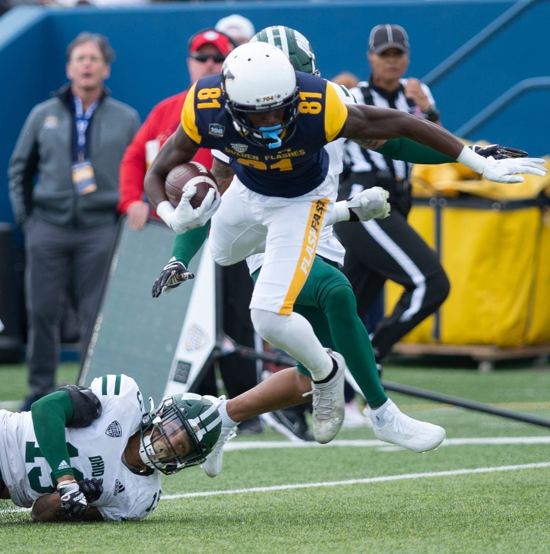 Kent State University hosted Ohio University for the 2022 Homecoming game on Saturday, October 1. The Golden Flashes win in overtime, 31-24. Devontez Walker break free of defender Zack Sanders and gets more yards.

Ksu V Ou 100122 Ls06