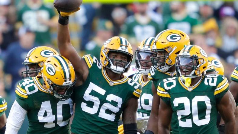 Green Bay Packers linebacker Rashan Gary (52) celebrates with teammates after sacking New England Patriots quarterback Bailey Zappe during their football game Sunday, October 2, at Lambeau Field in Green Bay, Wis. Dan Powers/USA TODAY NETWORK-Wisconsin

Apc Packvspatriots 1002221286djpc