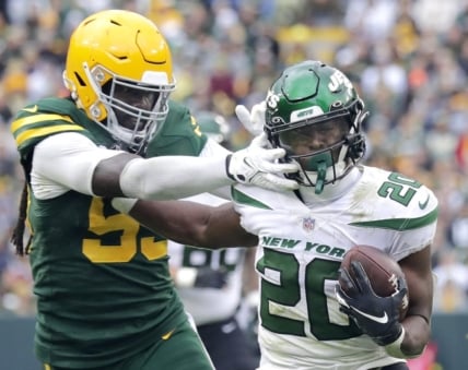 Oct 16, 2022; Green Bay, Wisconsin, USA; Green Bay Packers linebacker De'Vondre Campbell (59) chases New York Jets running back Breece Hall (20) during the second half at Lambeau Field. Mandatory Credit: Wm. Glasheen/Appleton Post-Crescent-USA TODAY NETWORK