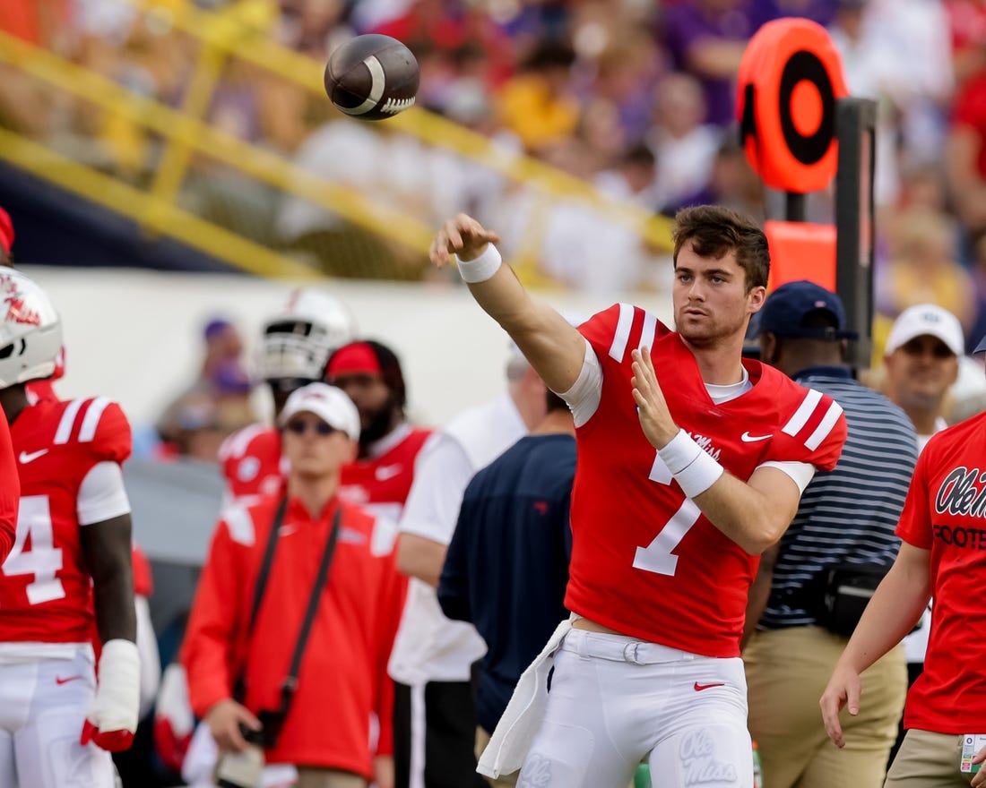 Oct 22, 2022; Baton Rouge, Louisiana, USA;  Mississippi Rebels quarterback Luke Altmyer (7) warms up on a time out again the LSU Tigers during the first half at Tiger Stadium. Mandatory Credit: Stephen Lew-USA TODAY Sports