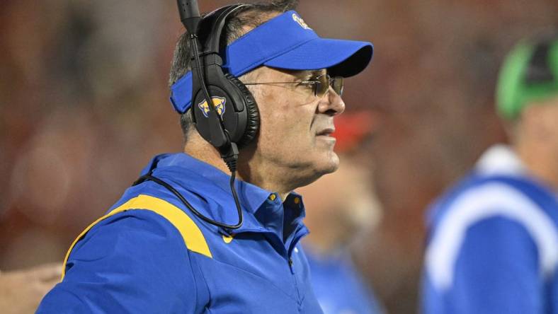 Oct 22, 2022; Louisville, Kentucky, USA;  Pittsburgh Panthers head coach Pat Narduzzi watches from the sideline during the first half against the Louisville Cardinals at Cardinal Stadium. Louisville won 24-10. Mandatory Credit: Jamie Rhodes-USA TODAY Sports