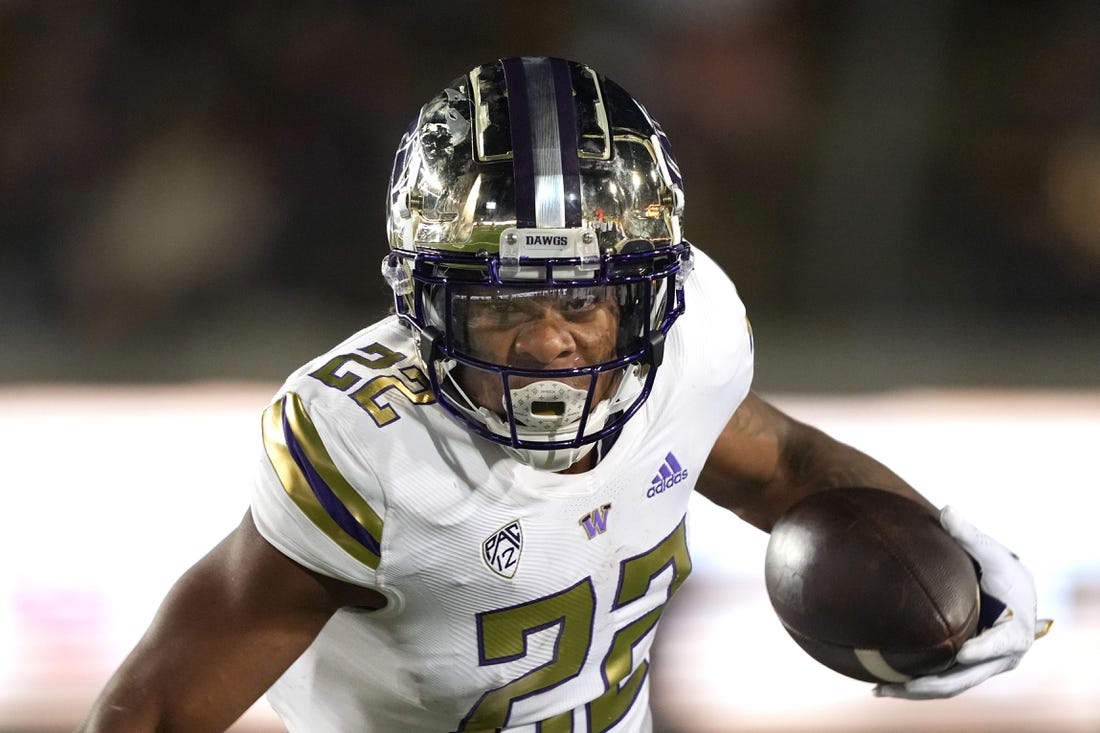 Oct 22, 2022; Berkeley, California, USA; Washington Huskies running back Cameron Davis (22) carries the ball against the California Golden Bears during the third quarter at FTX Field at California Memorial Stadium. Mandatory Credit: Darren Yamashita-USA TODAY Sports