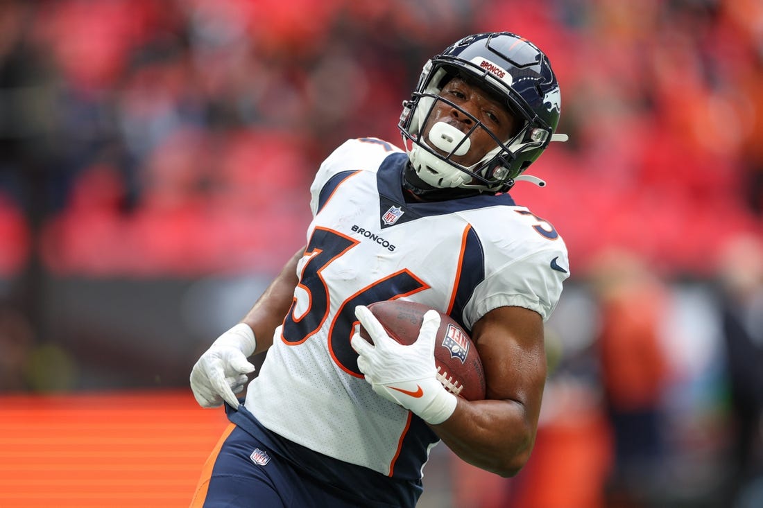 Oct 30, 2022; London, United Kingdom, Denver Broncos running back Devine Ozigbo (36) warms up before a game against the Jacksonville Jaguars during an NFL International Series game at Wembley Stadium. Mandatory Credit: Nathan Ray Seebeck-USA TODAY Sports