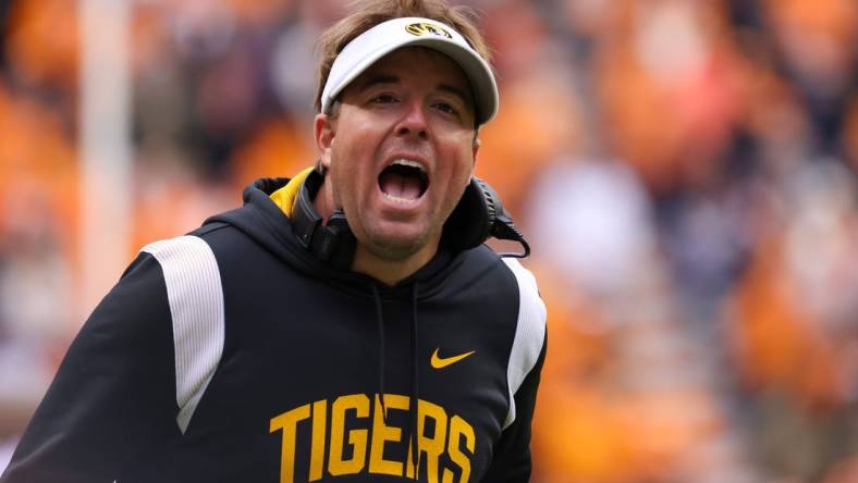 Nov 12, 2022; Knoxville, Tennessee, USA; Missouri Tigers head coach Eliah Drinkwitz reacts to an officials call during the second half against the Tennessee Volunteers at Neyland Stadium. Mandatory Credit: Randy Sartin-USA TODAY Sports