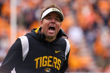 Nov 12, 2022; Knoxville, Tennessee, USA; Missouri Tigers head coach Eliah Drinkwitz reacts to an officials call during the second half against the Tennessee Volunteers at Neyland Stadium. Mandatory Credit: Randy Sartin-USA TODAY Sports