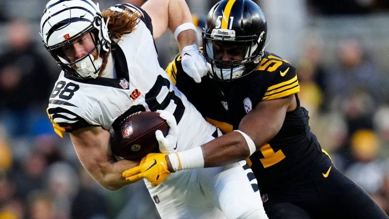 Cincinnati Bengals tight end Hayden Hurst (88) is brought down by Pittsburgh Steelers linebacker Myles Jack (51) on a reception in the first quarter of of the NFL Week 11 game between the Pittsburgh Steelers and the Cincinnati Bengals at Acrisure Stadium in Pittsburgh on Sunday, Nov. 20, 2022. The Steelers led 20-17 at halftime.

Cincinnati Bengals At Pittsburgh Steelers Week 11