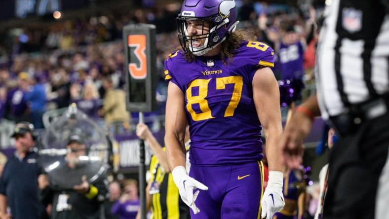 Nov 24, 2022; Minneapolis, Minnesota, USA; Minnesota Vikings tight end T.J. Hockenson (87) celebrates his touchdown against the New England Patriots during the second quarter at U.S. Bank Stadium. Mandatory Credit: Matt Krohn-USA TODAY Sports