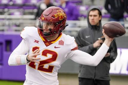 Nov 26, 2022; Fort Worth, Texas, USA; Iowa State Cyclones quarterback Hunter Dekkers (12) warms up prior to a game against the TCU Horned Frogs at Amon G. Carter Stadium. Mandatory Credit: Raymond Carlin III-USA TODAY Sports