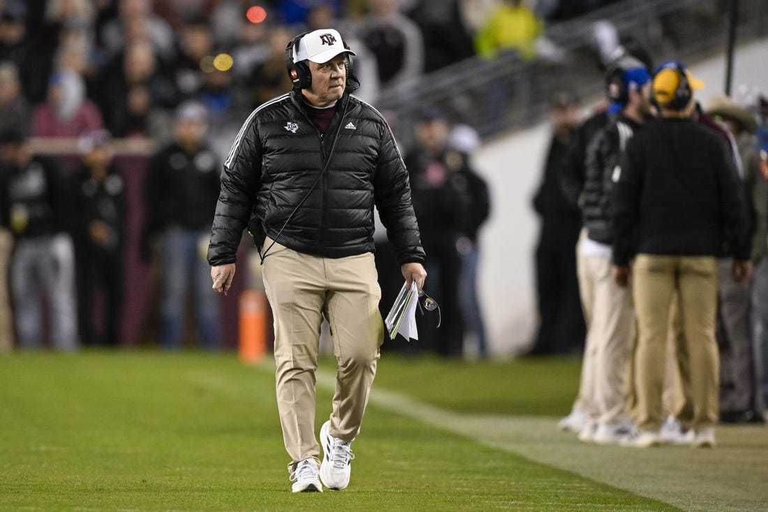 Nov 26, 2022; College Station, Texas, USA; Texas A&M Aggies head coach Jimbo Fisher walks the sidelines during the second quarter against the LSU Tigers at Kyle Field. Mandatory Credit: Jerome Miron-USA TODAY Sports