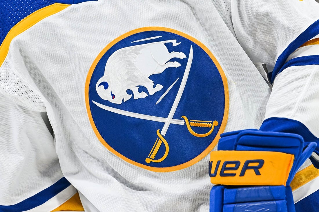 Nov 22, 2022; Montreal, Quebec, CAN; View of a Buffalo Sabres logo on a jersey worn by a member of the team during warm-up before the game against the Montreal Canadiens at Bell Centre. Mandatory Credit: David Kirouac-USA TODAY Sports