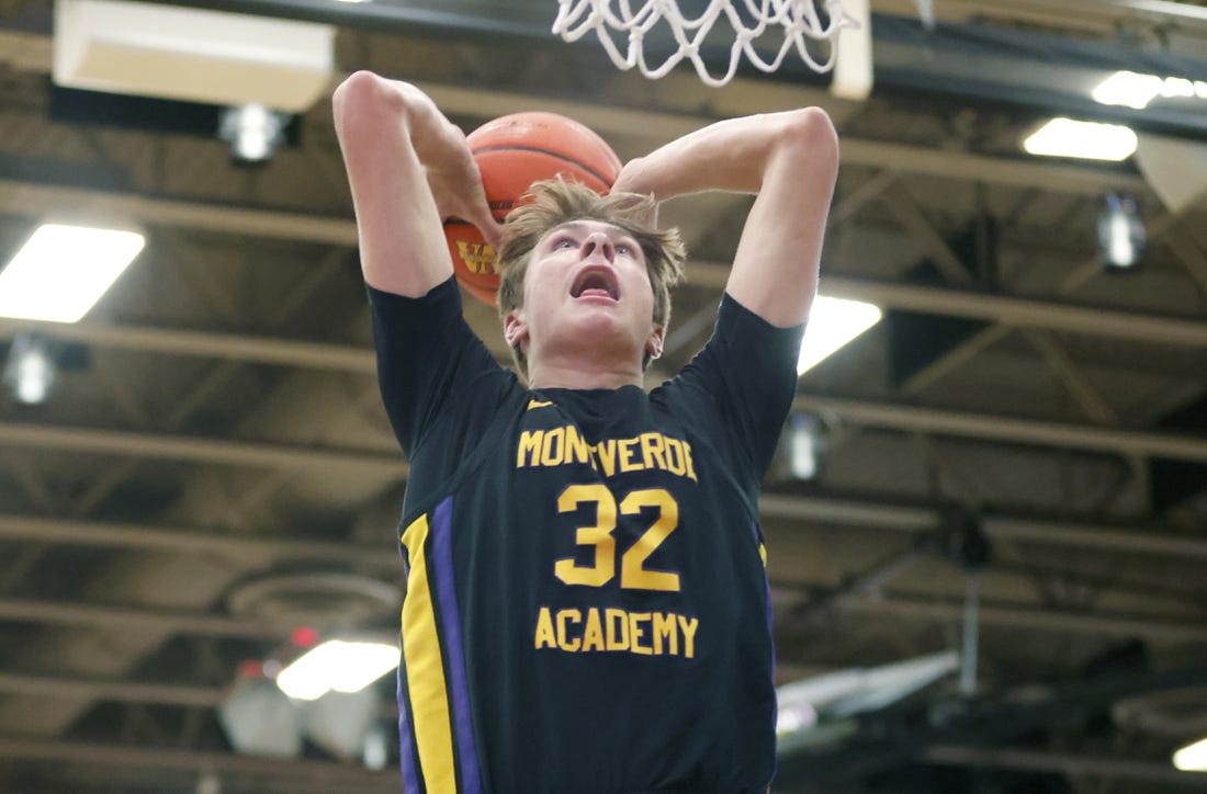 Dec 1, 2022; Montverde, Florida, USA; Montverde Academy forward Cooper Flagg (32) dunks the ball during the second quarter of the Sunshine Classic basketball tournament against IMG Academy at Mills Championship Court on the campus of Montverde Academy. Mandatory Credit: Reinhold Matay-USA TODAY Sports