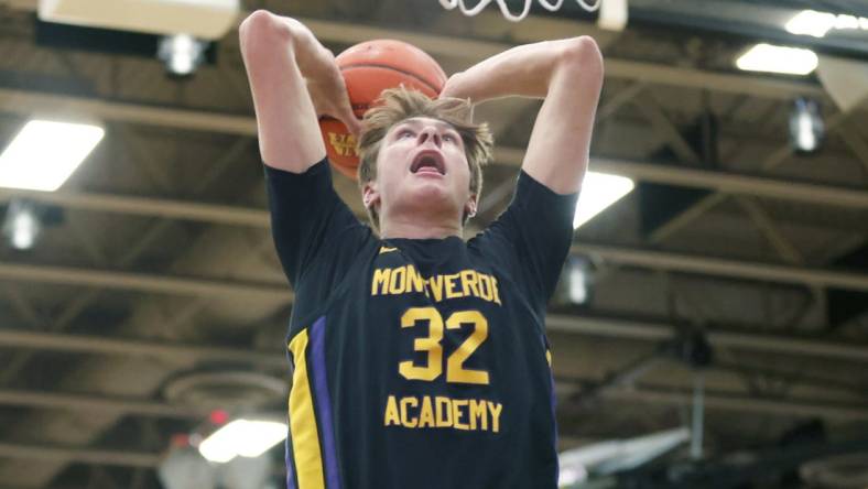 Dec 1, 2022; Montverde, Florida, USA; Montverde Academy forward Cooper Flagg (32) dunks the ball during the second quarter of the Sunshine Classic basketball tournament against IMG Academy at Mills Championship Court on the campus of Montverde Academy. Mandatory Credit: Reinhold Matay-USA TODAY Sports