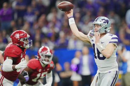 Dec 31, 2022; New Orleans, LA, USA; Kansas State Wildcats quarterback Will Howard (18) throws against the Alabama Crimson Tide during the second half in the 2022 Sugar Bowl at Caesars Superdome. Mandatory Credit: Andrew Wevers-USA TODAY Sports