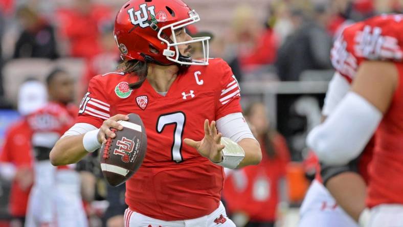 Jan 2, 2023; Pasadena, California, USA; Utah Utes quarterback Cameron Rising (7) warms up before the game between the Utah Utes and the Penn State Nittany Lions at Rose Bowl. Mandatory Credit: Jayne Kamin-Oncea-USA TODAY Sports