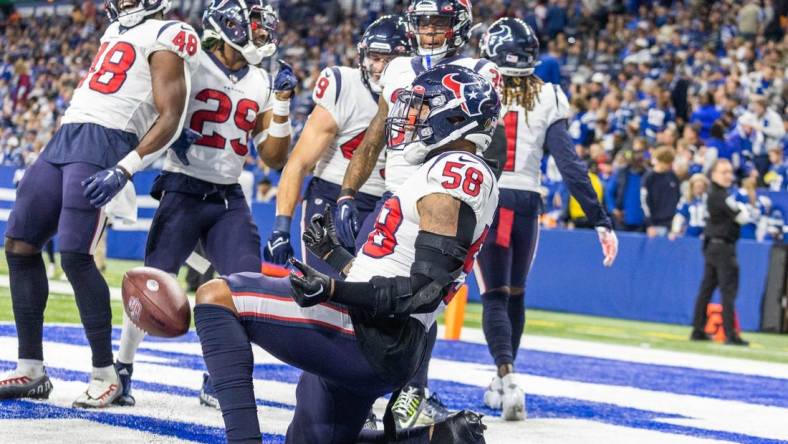 Jan 8, 2023; Indianapolis, Indiana, USA; Houston Texans linebacker Christian Kirksey (58) celebrates his interception with teammates in the first half against the Indianapolis Colts at Lucas Oil Stadium. Mandatory Credit: Trevor Ruszkowski-USA TODAY Sports