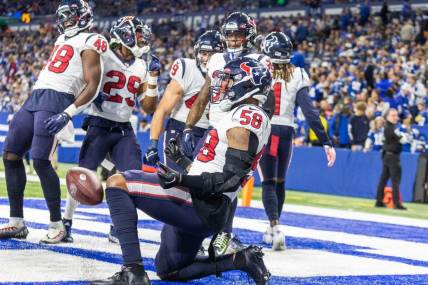 Jan 8, 2023; Indianapolis, Indiana, USA; Houston Texans linebacker Christian Kirksey (58) celebrates his interception with teammates in the first half against the Indianapolis Colts at Lucas Oil Stadium. Mandatory Credit: Trevor Ruszkowski-USA TODAY Sports