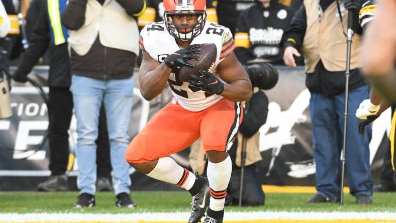 Jan 8, 2023; Pittsburgh, Pennsylvania, USA;  Cleveland Browns running back Nick Chubb (24) scores a touchdown against the Pittsburgh Steelers during the fourth quarter at Acrisure Stadium. Mandatory Credit: Philip G. Pavely-USA TODAY Sports