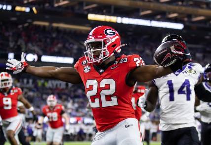 Jan 9, 2023; Inglewood, CA, USA; Georgia Bulldogs running back Branson Robinson (22) celebrates as he scores a rushing touchdown against the TCU Horned Frogs during the CFP national championship game at SoFi Stadium. Mandatory Credit: Mark J. Rebilas-USA TODAY Sports