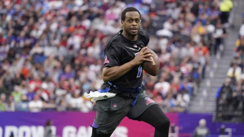 Feb 5, 2023; Paradise, Nevada, USA; NFC quarterback Geno Smith of the Seattle Seahawks (7) runs the ball during the second half against the AFC during the 2023 Pro Bowl at Allegiant Stadium. Mandatory Credit: Lucas Peltier-USA TODAY Sports