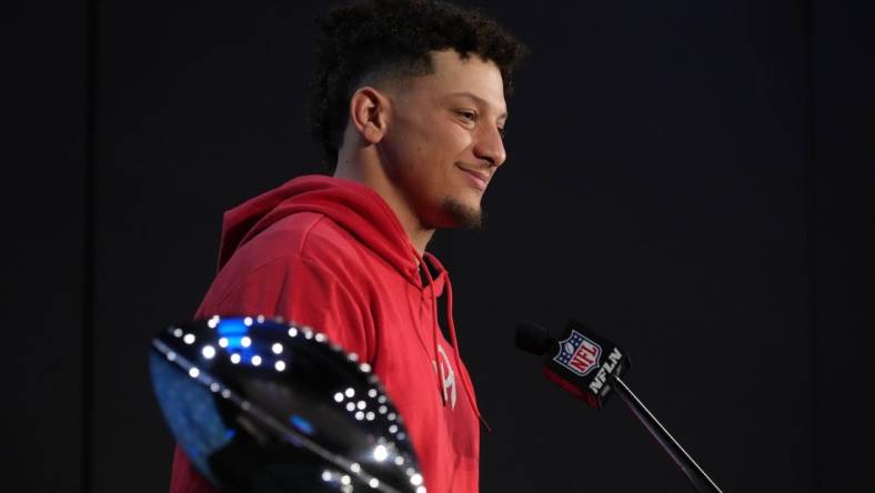 Feb 13, 2023; Phoenix, AZ, USA; Kansas City Chiefs quarterback Patrick Mahomes speaks flanked by Vince Lombardi Trophy during the Super Bowl 57 Winning Team Head Coach and MVP press conference at the Phoenix Convention Center. Mandatory Credit: Kirby Lee-USA TODAY Sports