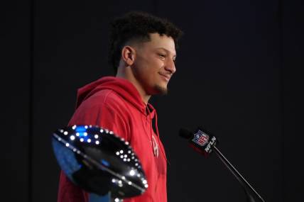 Feb 13, 2023; Phoenix, AZ, USA; Kansas City Chiefs quarterback Patrick Mahomes speaks flanked by Vince Lombardi Trophy during the Super Bowl 57 Winning Team Head Coach and MVP press conference at the Phoenix Convention Center. Mandatory Credit: Kirby Lee-USA TODAY Sports
