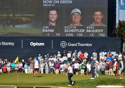 The group of Jon Rahm, Scottie Scheffler and Rory McIlroy on the green of island holes 17 during first round action of The Players Championship in Ponte Vedra Beach, FL, Thursday, March 9, 2023.

Jki 030923 Bs The Players Thursday 16