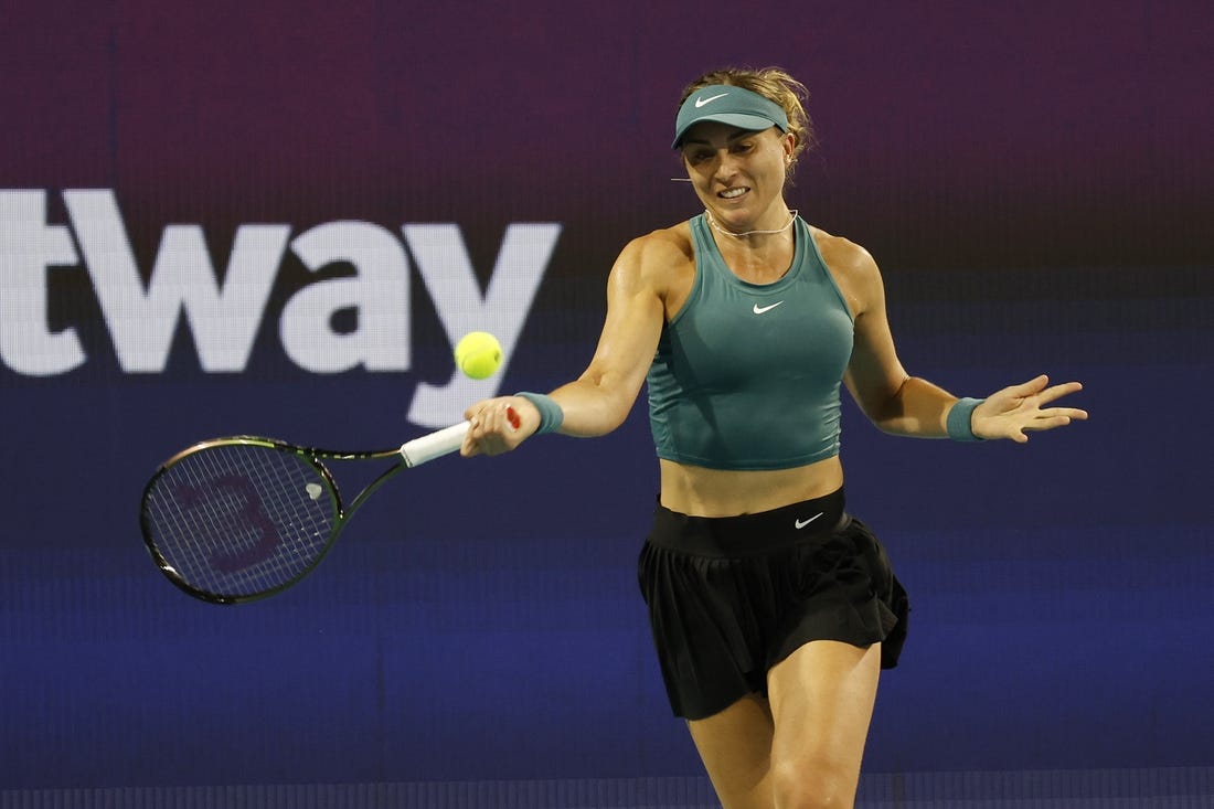 Mar 25, 2023; Miami, Florida, US; Paula Badosa (ESP) hits a forehand against Elena Rybakina (KAZ) (not pictured) on day six of the Miami Open at Hard Rock Stadium. Mandatory Credit: Geoff Burke-USA TODAY Sports