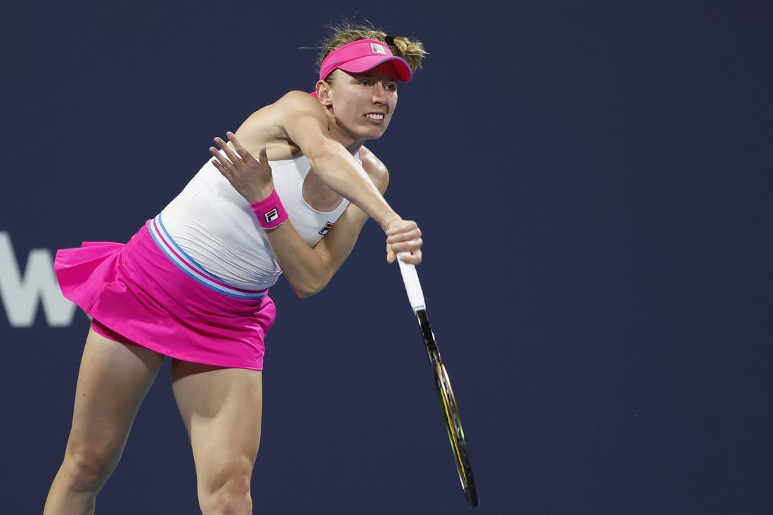 Mar 27, 2023; Miami, Florida, US; Ekaterina Alexandrova serves against Bianca Andreescu (CAN) (not pictured) on day eight of the Miami Open at Hard Rock Stadium. Mandatory Credit: Geoff Burke-USA TODAY Sports