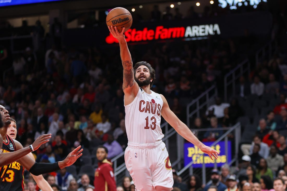 Mar 28, 2023; Atlanta, Georgia, USA; Cleveland Cavaliers guard Ricky Rubio (13) shoots against the Atlanta Hawks in the second quarter at State Farm Arena. Mandatory Credit: Brett Davis-USA TODAY Sports