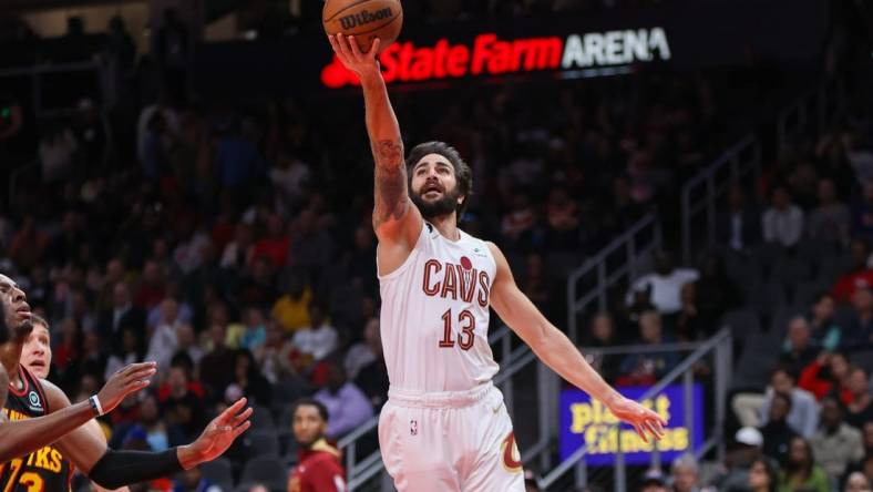 Mar 28, 2023; Atlanta, Georgia, USA; Cleveland Cavaliers guard Ricky Rubio (13) shoots against the Atlanta Hawks in the second quarter at State Farm Arena. Mandatory Credit: Brett Davis-USA TODAY Sports