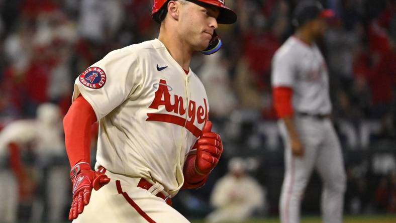 Apr 11, 2023; Anaheim, California, USA; Los Angeles Angels catcher Logan O'Hoppe (14) heads to first on a solo home run in the sixth inning against the Washington Nationals at Angel Stadium. Mandatory Credit: Jayne Kamin-Oncea-USA TODAY Sports