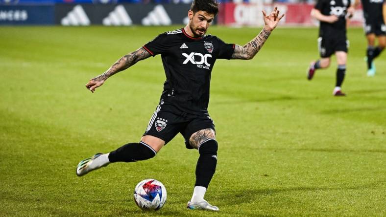 Apr 15, 2023; Montreal, Quebec, CAN;DC United forward Taxi Fountas (11) kicks the ball during the first half against D.C. United at Stade Saputo. Mandatory Credit: David Kirouac-USA TODAY Sports