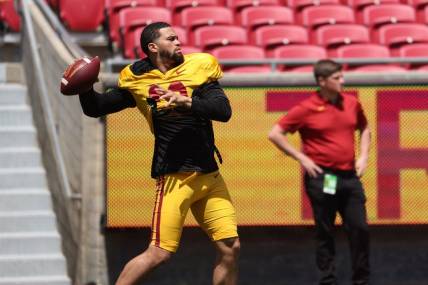 Apr 15, 2023; Los Angeles, CA, USA;  USC Trojans quarterback Caleb Williams (13) throws a ball on the sideline during the Spring Game at Los Angeles Memorial Coliseum. Mandatory Credit: Kiyoshi Mio-USA TODAY Sports