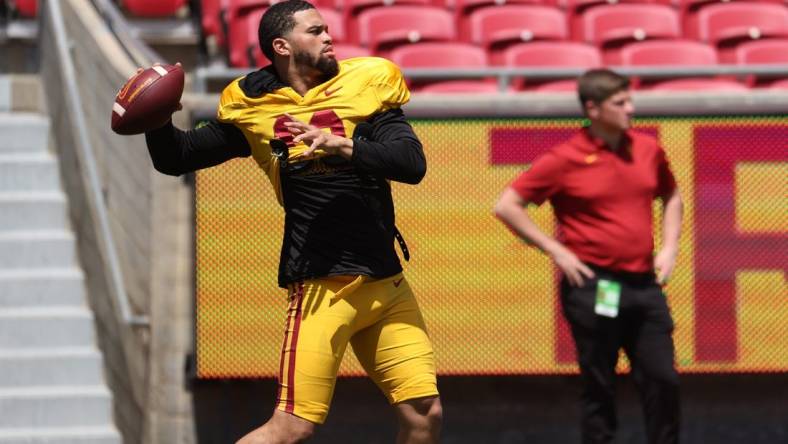 Apr 15, 2023; Los Angeles, CA, USA;  USC Trojans quarterback Caleb Williams (13) throws a ball on the sideline during the Spring Game at Los Angeles Memorial Coliseum. Mandatory Credit: Kiyoshi Mio-USA TODAY Sports