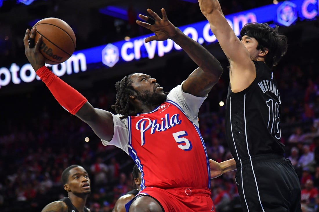 Apr 15, 2023; Philadelphia, Pennsylvania, USA; Philadelphia 76ers center Montrezl Harrell (5) shoots over Brooklyn Nets forward Yuta Watanabe (18) during game one of the 2023 NBA playoffs at Wells Fargo Center. Mandatory Credit: Eric Hartline-USA TODAY Sports