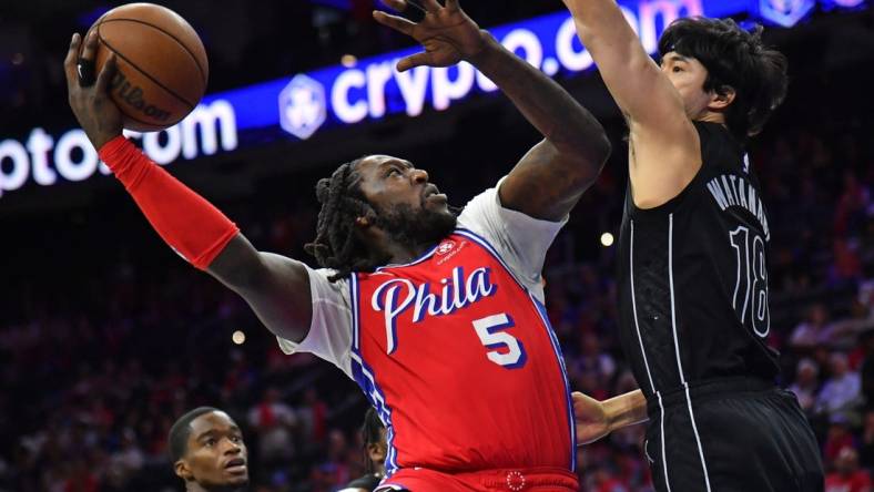 Apr 15, 2023; Philadelphia, Pennsylvania, USA; Philadelphia 76ers center Montrezl Harrell (5) shoots over Brooklyn Nets forward Yuta Watanabe (18) during game one of the 2023 NBA playoffs at Wells Fargo Center. Mandatory Credit: Eric Hartline-USA TODAY Sports