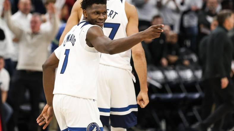 Apr 23, 2023; Minneapolis, Minnesota, USA; Minnesota Timberwolves guard Anthony Edwards (1) reacts to his shot against the Denver Nuggets during overtime of game four of the 2023 NBA Playoffs at Target Center. Mandatory Credit: Matt Krohn-USA TODAY Sports